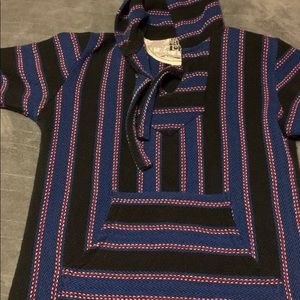 Blue, black, and red sweater